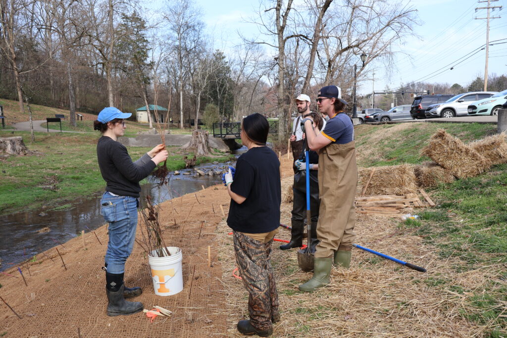 Group of people watching a demonstration outside